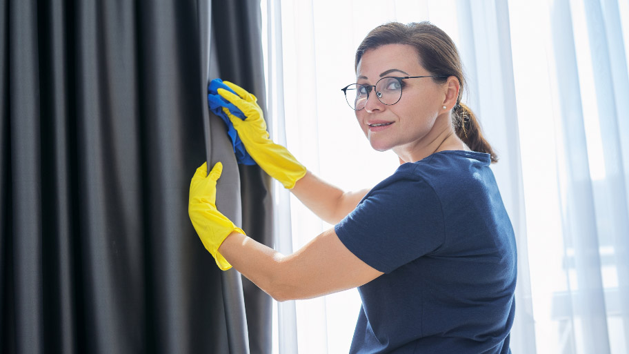 Woman Doing DIY Winter Pest Control